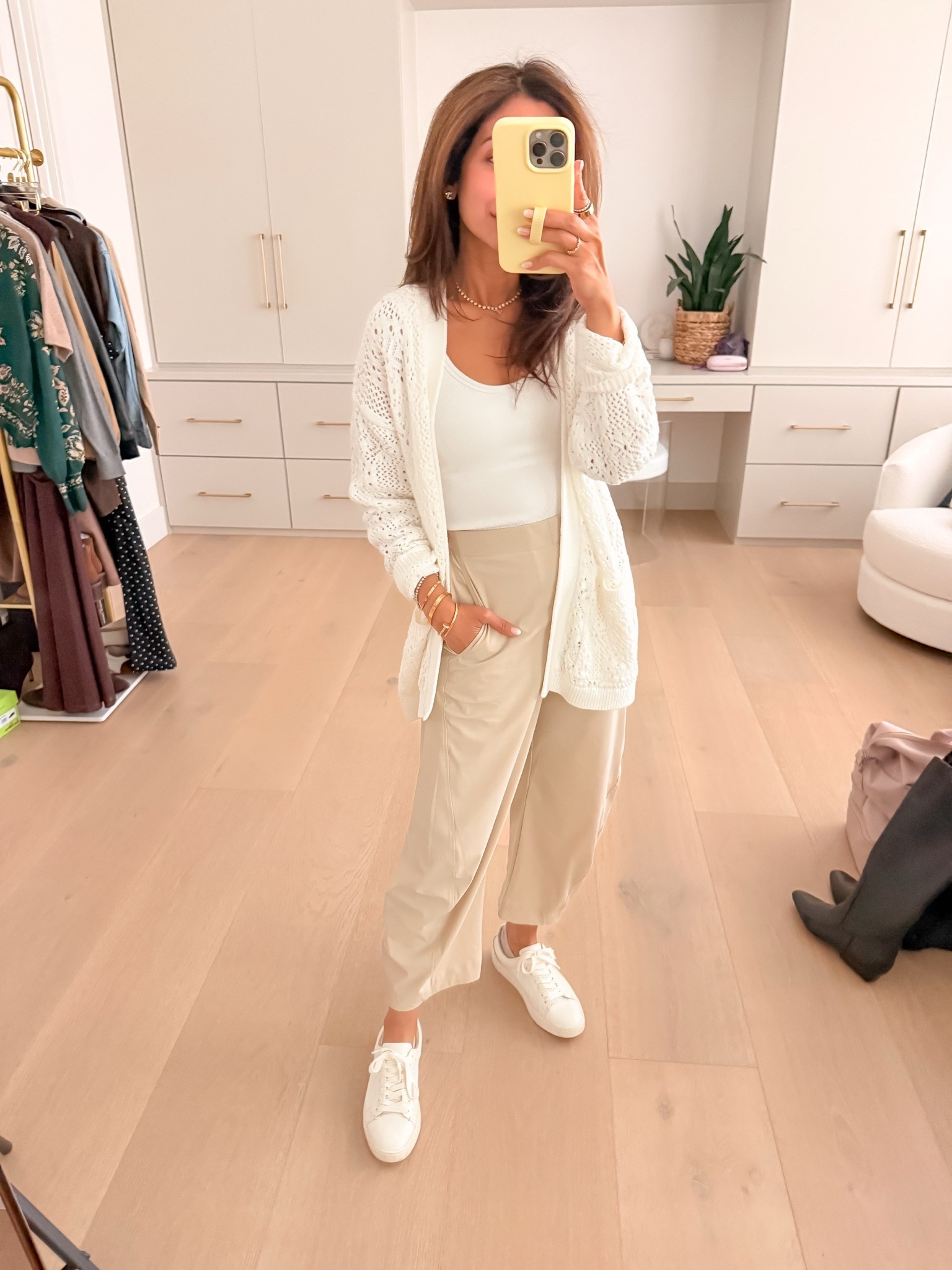 Today's travel outfit for a long international trip. Wearing an xs in bra free tank & cardigan, and 0petite in these lightweight comfy pants!

#LTKPetite #LTKTravel