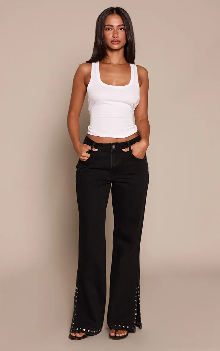 Petite Black Flared Stud Split Hem Jeans | PrettyLittleThing US