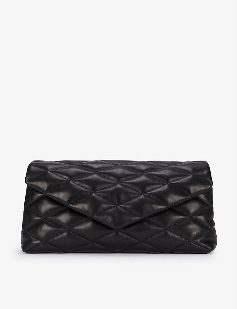 Monogram quilted leather clutch bag | Selfridges