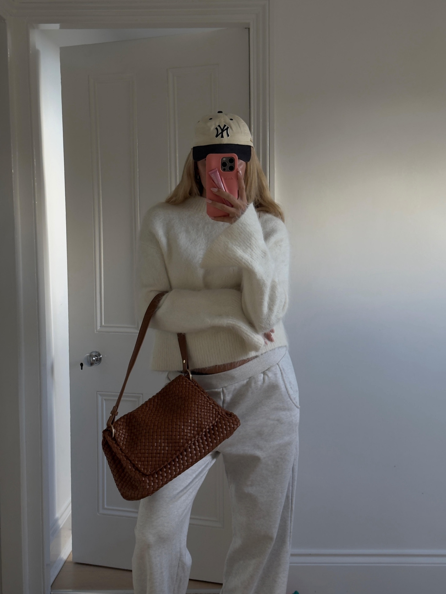 Cosy autumn outfit, adanola joggers, white fluffy jumper, transitional style, casual outfit, loungewear, woven Anthropologie bag, NY cap, rhode phone case and lip peptide 

#LTKstyletip #LTKuk #LTKautumn
