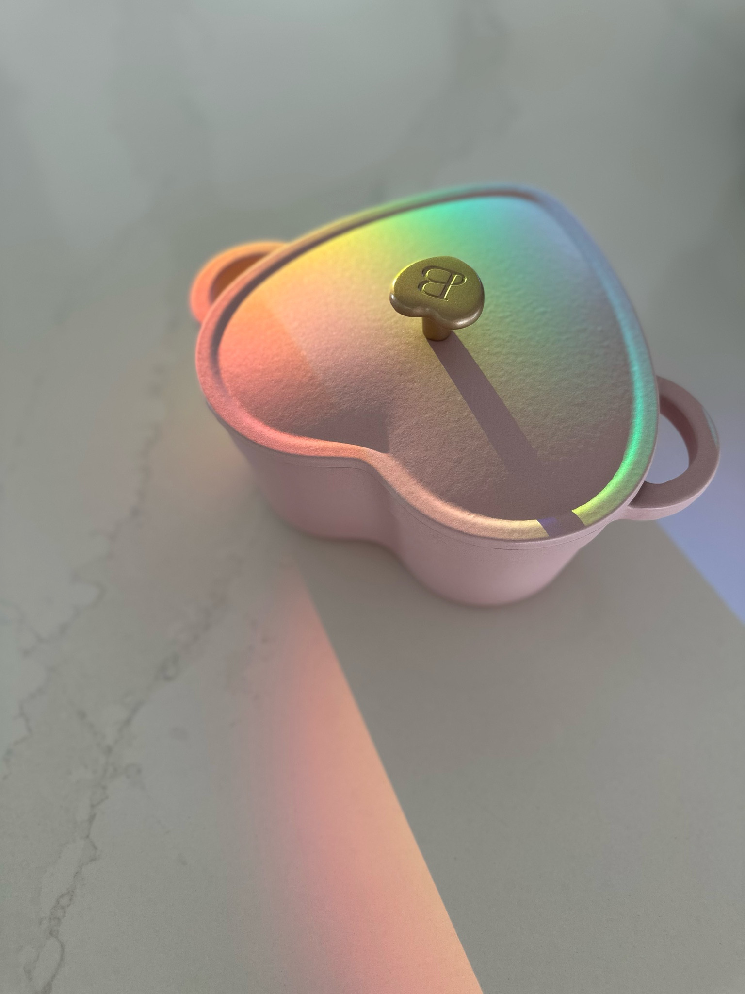 My new blush pink cast iron Dutch oven during rainbow hour 🥰 it’s pink, but the rainbow lights were shining and this photo is so beautiful! 2qt capacity 

#LTKMostLoved #LTKfindsunder50 #LTKhome