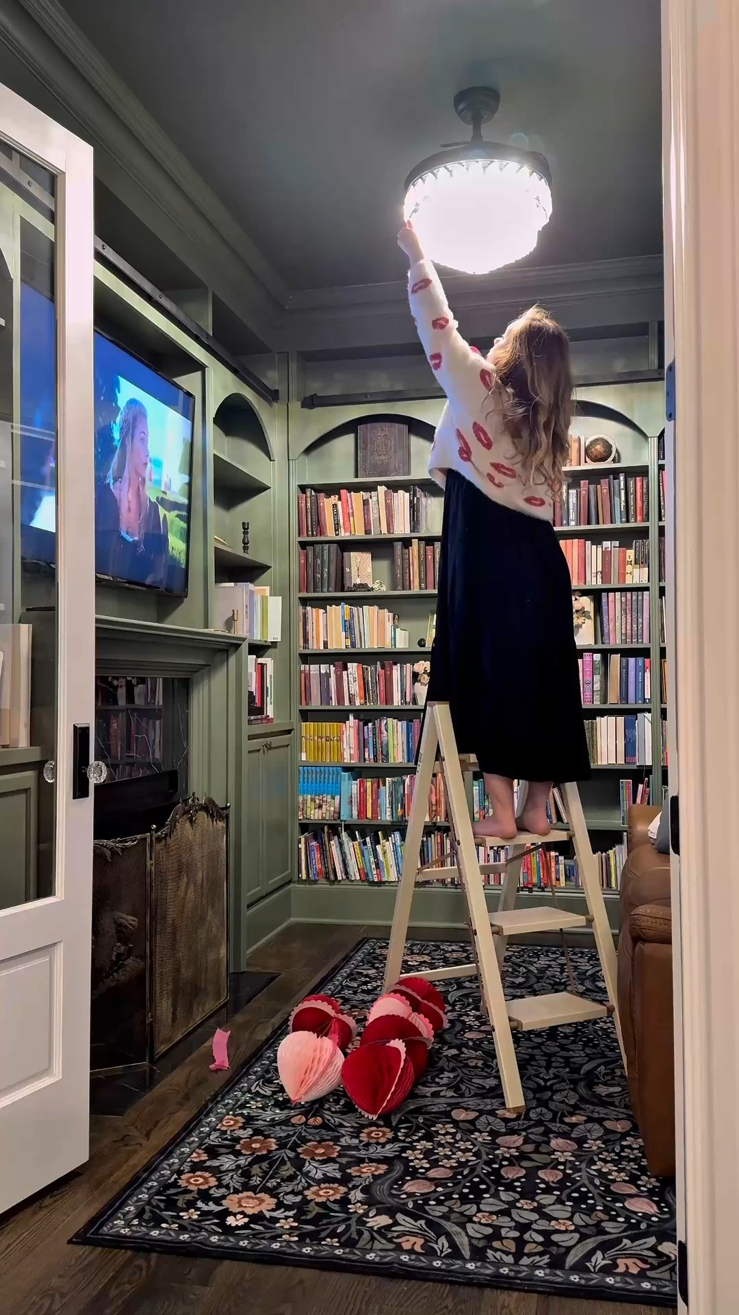 Happy Valentine's Weekend! 

I decorated our library for Valentine's Day with the hope of creating a fun space for the weekend. 

But by morning, 1/4 of it had already fallen. I had made the glue dots less sticky because I was worried about them sticking too well to the paint and causing the paint to come off, but apparently I made them a little too unsticky 😅

But Ro loved it, and that’s all that matters!

What fun family plans do you have for the weekend? 

#LTKmomlife #LTKValentine #LTKHome