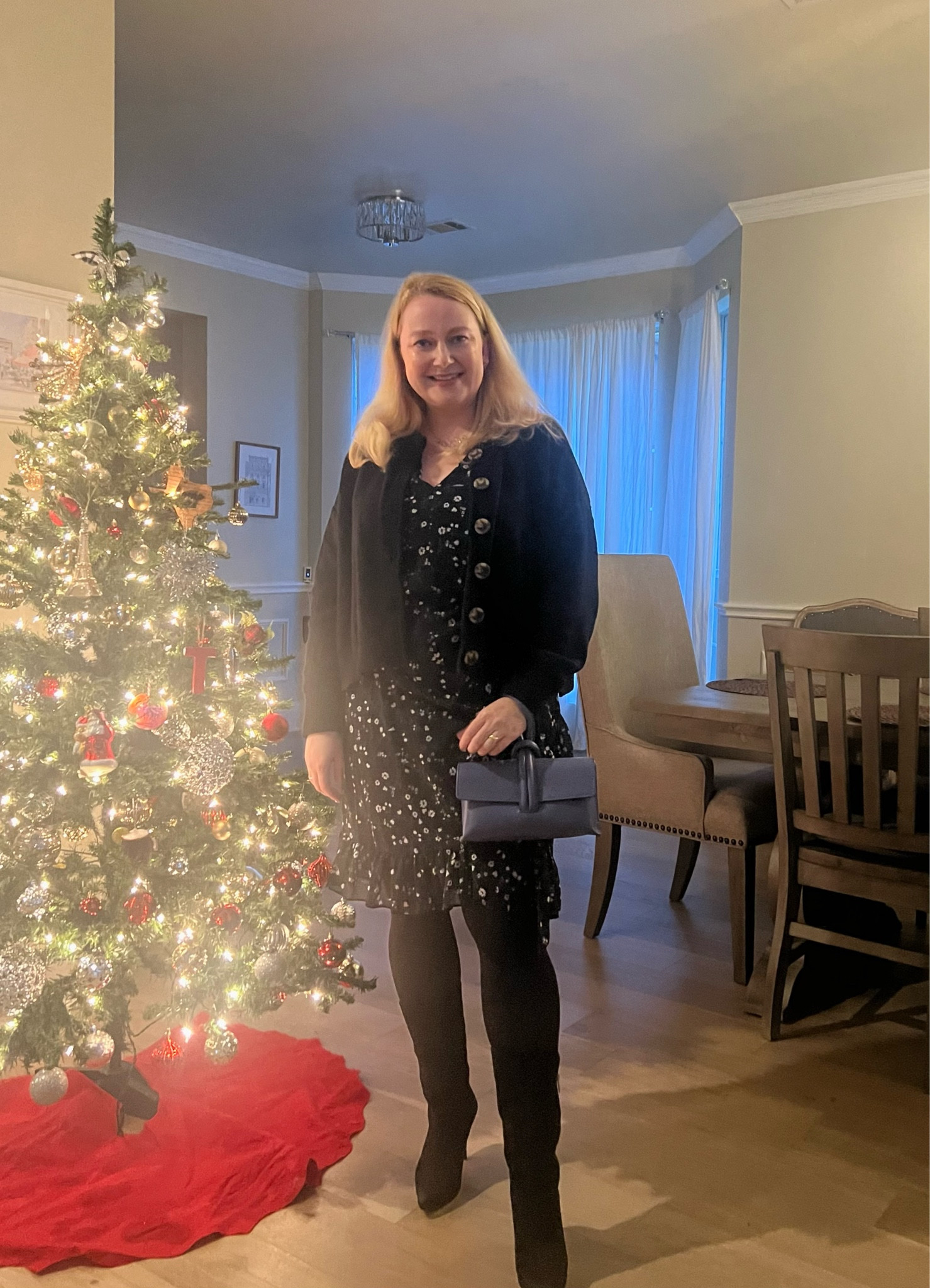 Simple but festive outfit: Karl Lagerfeld dress currently on sale 
Blue leather clutch 
Black cardigan that goes with everything 

#LTKSeasonal #LTKparties #LTKsalealert