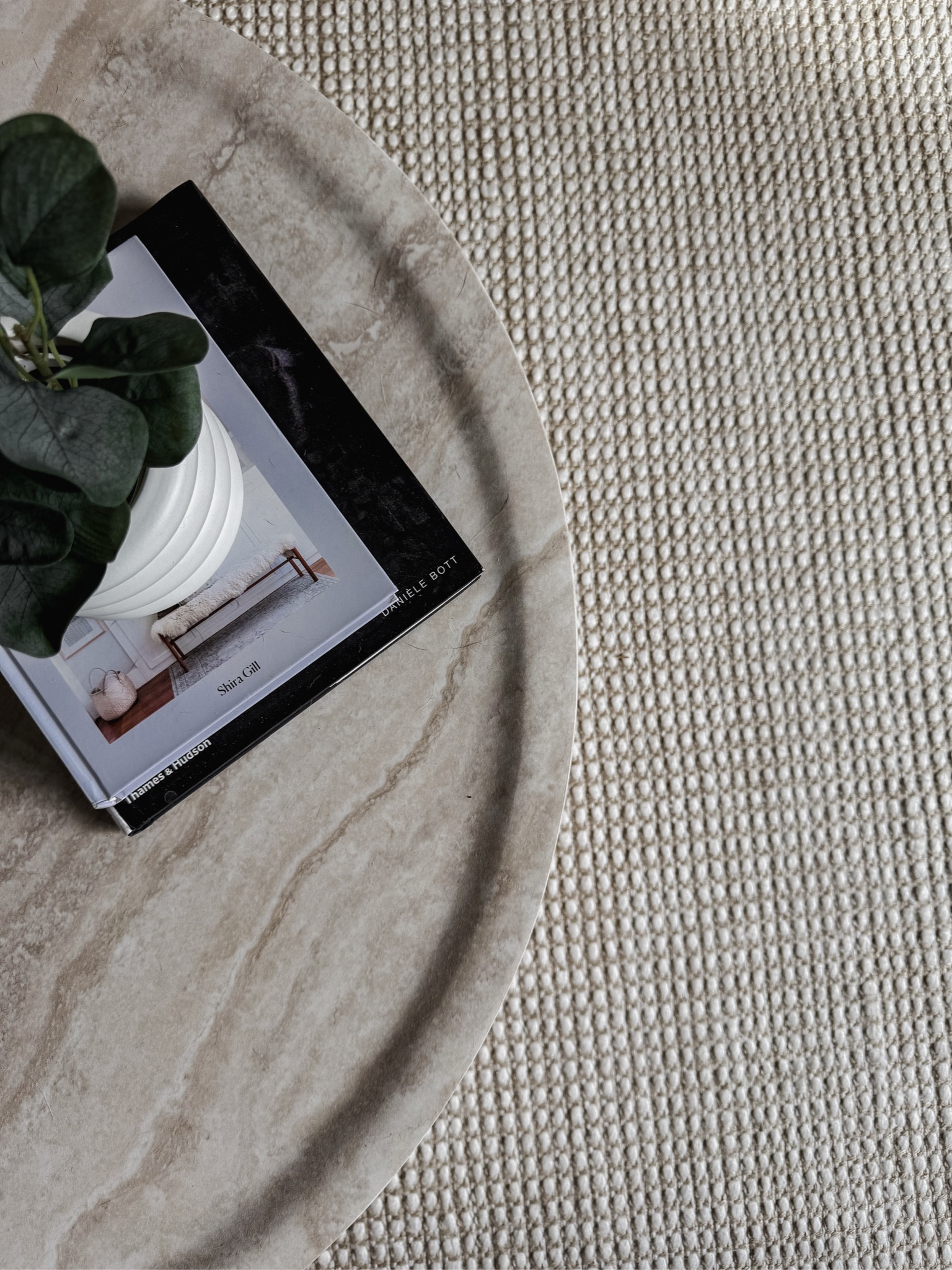 Faux travertine round coffee table. Natural color , affordable decor. Kid friendly. 

#LTKStyleTip #LTKHome