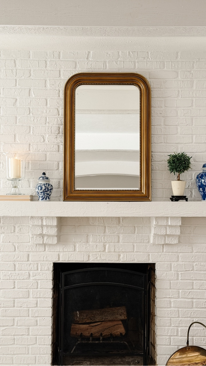 A good thrift find isn’t about what you buy, it’s more about how it’s styled. 

I love looking for pieces that repeat finishes (ie: glass, rattan, walnut wood tones) , colors and shapes that I already use throughout my home so they feel collected & layered on purpose 🤍

Transitional design inspo, traditional design inspo, flameless candle, footed glass hurricane, gold mirror, blue and white ginger jar, faux topiary, chinoiserie , living room inspo, living room design, living room refresh 

#LTKHome #LTKSaleAlert