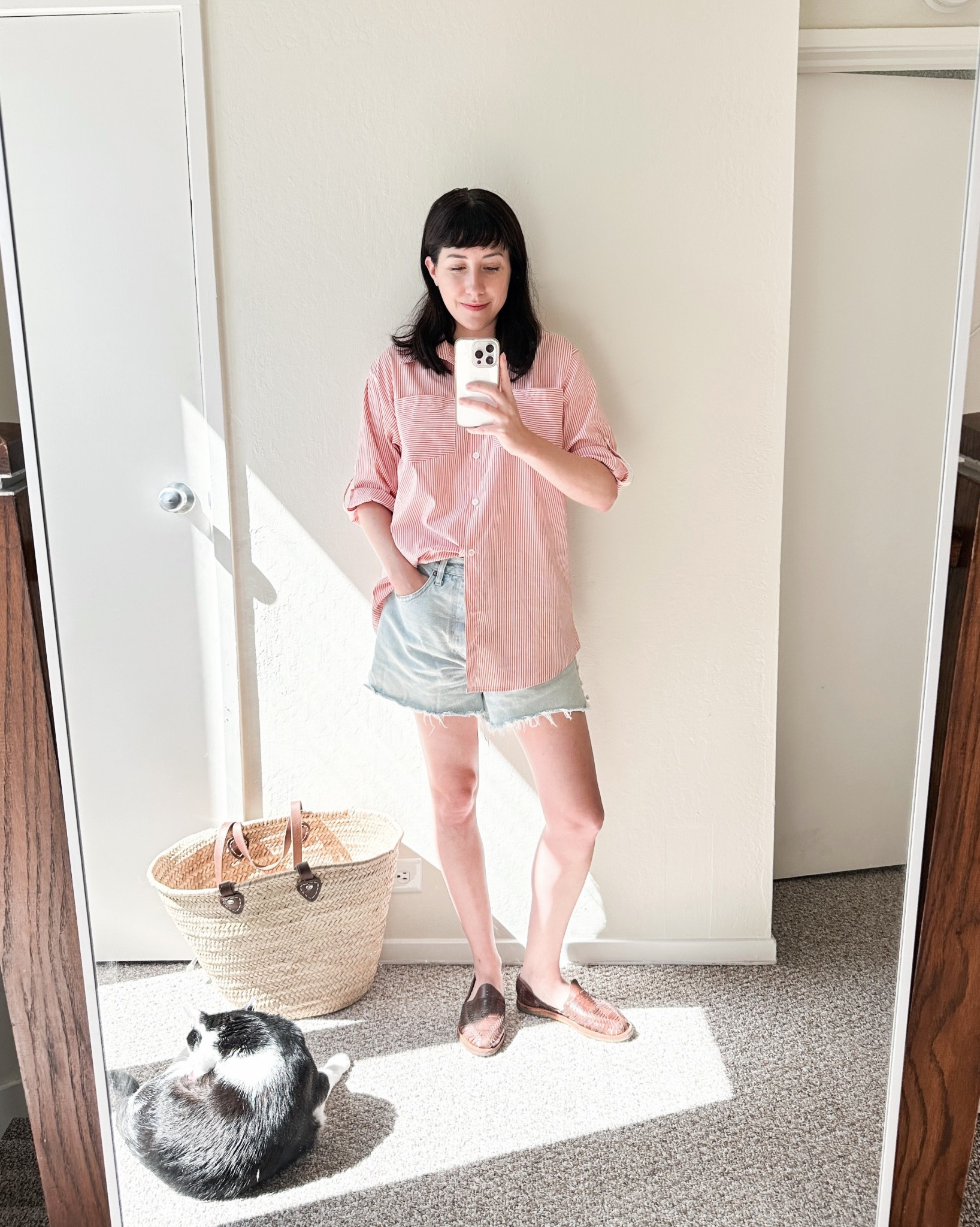 A favorite wfh outfit combo: an oversized button down and easy denim shorts. These ones from Agolde are so comfy I have multiple pairs. They run TTS. My huaraches are old but this Nisolo pair is a classic!