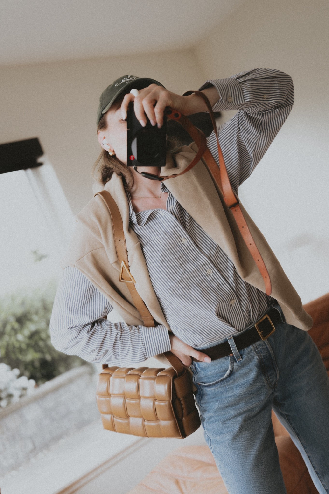 OOTD: striped shirt + rugger 🏉 + ball cap 🧢 + blue jeans + shoulder bag.
Shirt & belt: Buck Mason mainstay cotton shirt
Rugger: Lacoste
Bag: Bottega Veneta padded cassette
Hat: Frame
Jeans: @Levi's 501 90s fit

#LTKWorkwear #LTKSeasonal #LTKootd