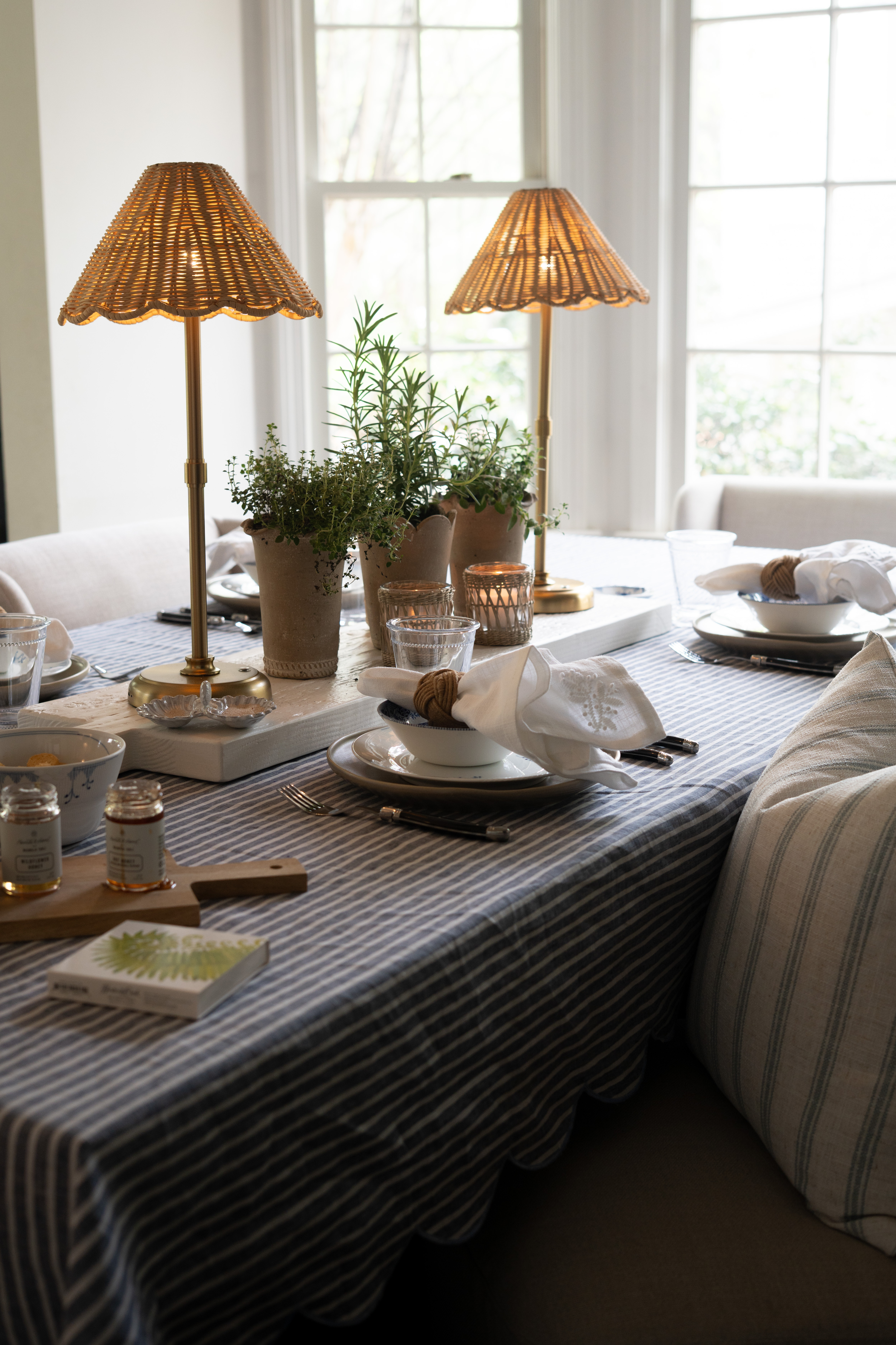 This is what I mean when I say a home should feel lived in and layered. Soft lighting, natural textures, and a simple blue and white palette come together to create a space that feels calm, welcoming, and thoughtfully put together. it's all creating an atmosphere people want to sit in and stay awhile... and you will for sure find us all here this spring!! 

 #LTKSeasonal #LTKHome #LTKSaleAlert