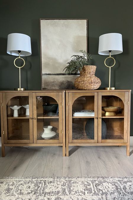 New cabinets: these are so pretty! Love the arched glass doors, the warmth of the wood, the brass hardware. These are two 32” cabinets.. a perfect fit for my home office! 
Wood storage cabinets


#LTKHome