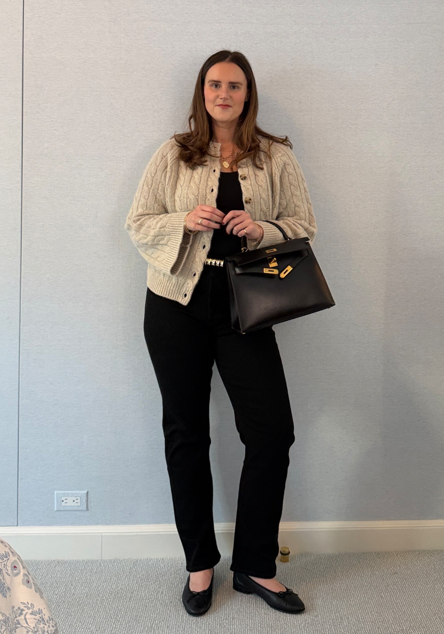 Simple and classic outfit of the day in New York City in black Agolde Jeans (size 33) and a Doen Cardigan (size XL) with a vintage Hermes Kelly and Chanel flats  

#LTKdayinmylife #LTKMidsize