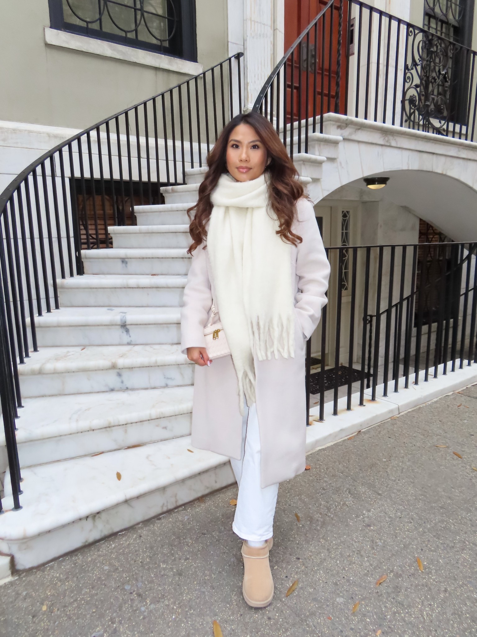 Ootd!! Just landed in New York 😍 love this city so much and so happy to be back for our annual visit! 

Staying extra cozy in this oversized knit scarf and long coat and Uggs // scarf is on sale for $29 and my coat is on sale for the clientele sale! 

Sizing:
Coat - sized down to 2XS in heather light oatmeal color
Sweater - tts, xs (sold out linked similar) 
Jeans - tts, 25 standard in crop style so it hits at the ankle, tile white wash (linked another similar pair since mine are almost sold out) 
Uggs - I size down a full size for my Uggs since the fur flattens, wearing sand color 