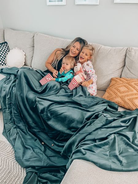 Cozy movie night UPGRADED with the BIG BLANKET!! It’s 10 x 10 and the fabric is temperature regulated so you don’t get too hot or cold! Plus it’s super sofftttttt 

#LTKhome #LTKkids #LTKfamily