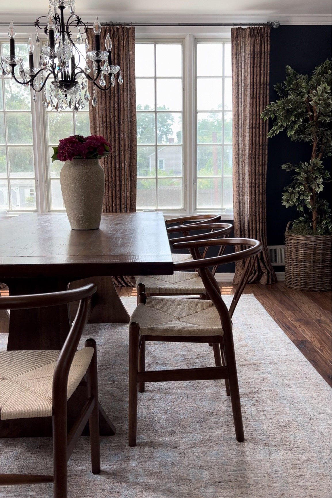 Dining room details, walnut wishbone chairs from @eternitymodernhome #ad

#LTKHome #LTKSummerSales