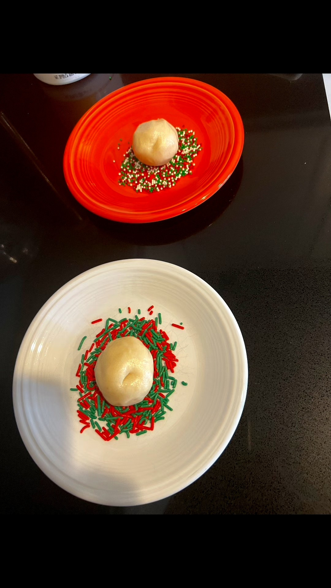 Premade sugar cookie dough- i used @pillsbury 
Roll in sprinkles 
Bake
Let cool for 5 minutes and push a shot glass down in the middle to make a cookie cup 
Fill with @phillycreamchs cheesecake 
And EAT! 

#LTKfoodie #LTKHoliday #LTKmomlife