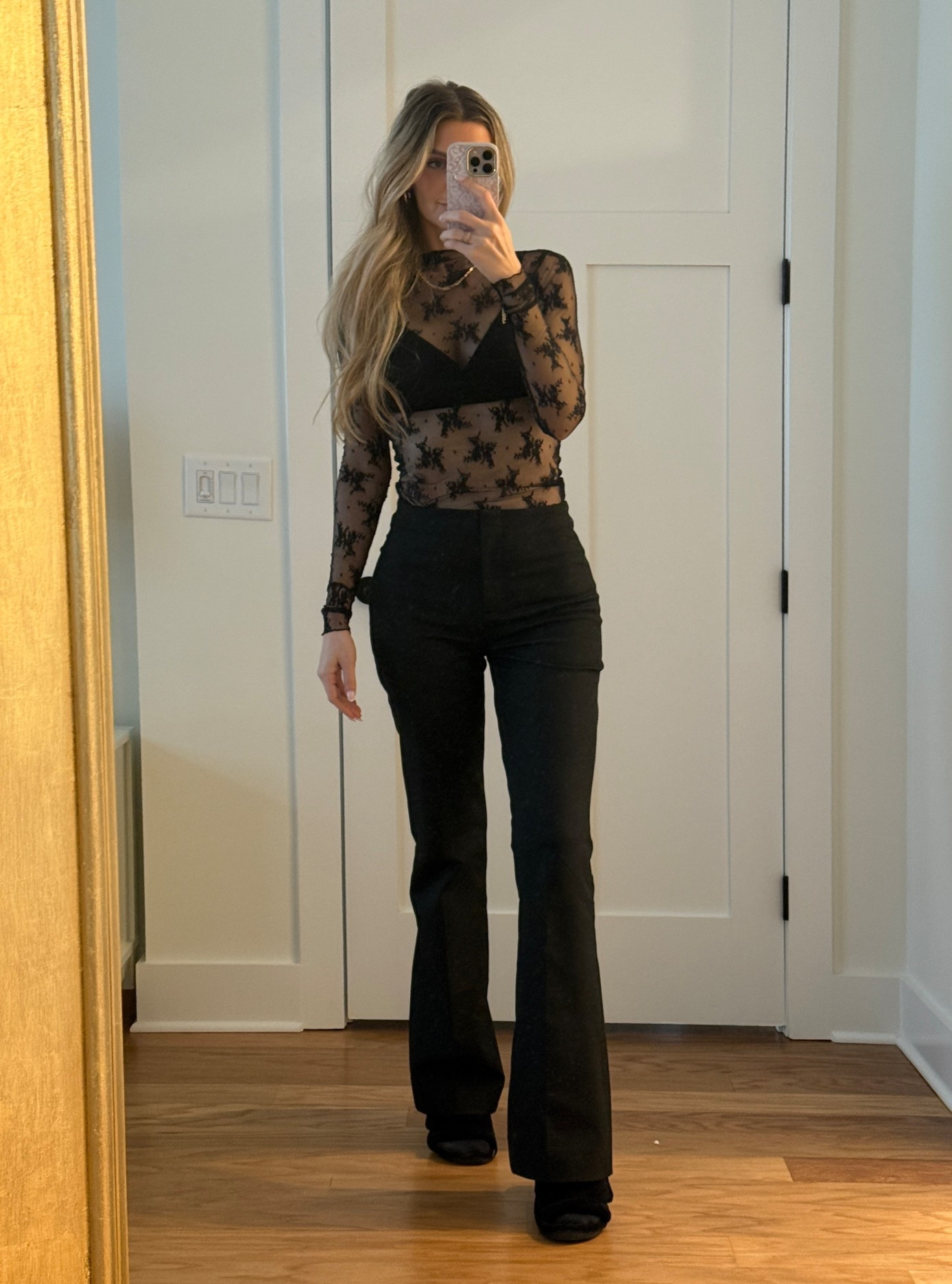 Black lace top from Revolve in XS with black dress pants from Abercrombie in long; 27. 🕊️✨🥂 

#LTKTall #LTKOver40 #LTKootd
