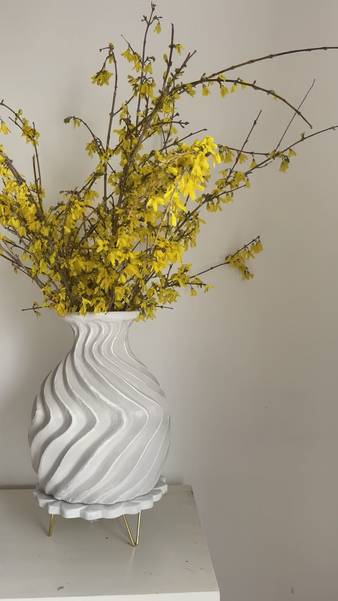 The boldness of yellow forsythia branches, cradled in a sculpted vase are a great way to add a touch of spring in your home.



#LTKSeasonal #LTKHome