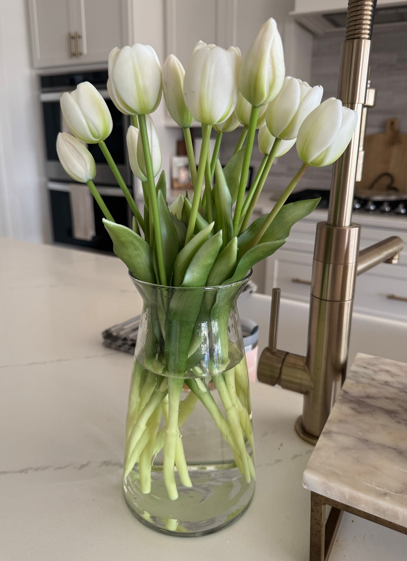 Just added some water to the vase of these faux tulips and they look so real! 🤯

#LTKSpringSale #LTKSeasonal #LTKHome