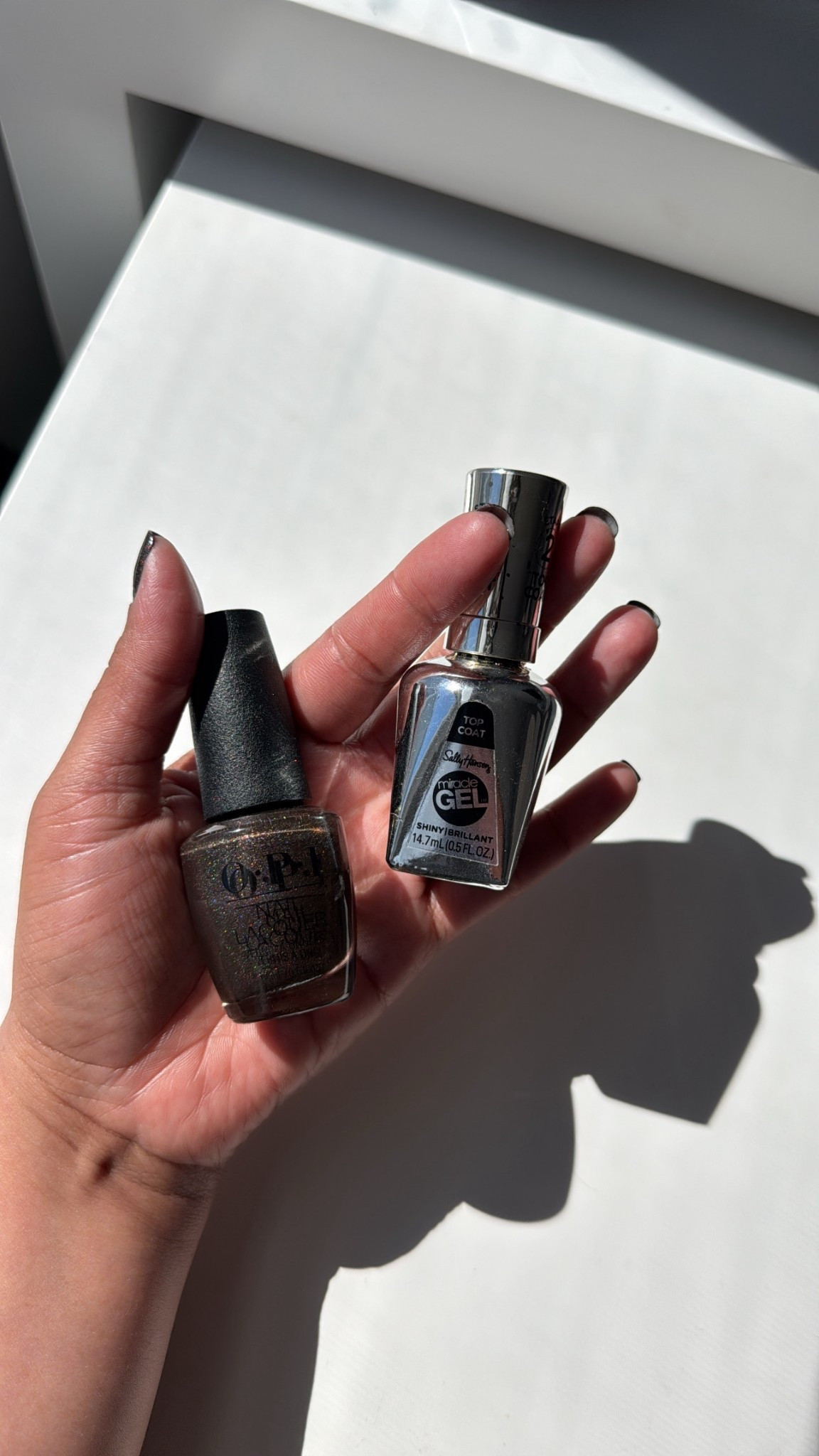 My favorite polish and top coat.
OPI my private jet, and Sally Hansen miracle gel topcoat 

#LTKBeauty