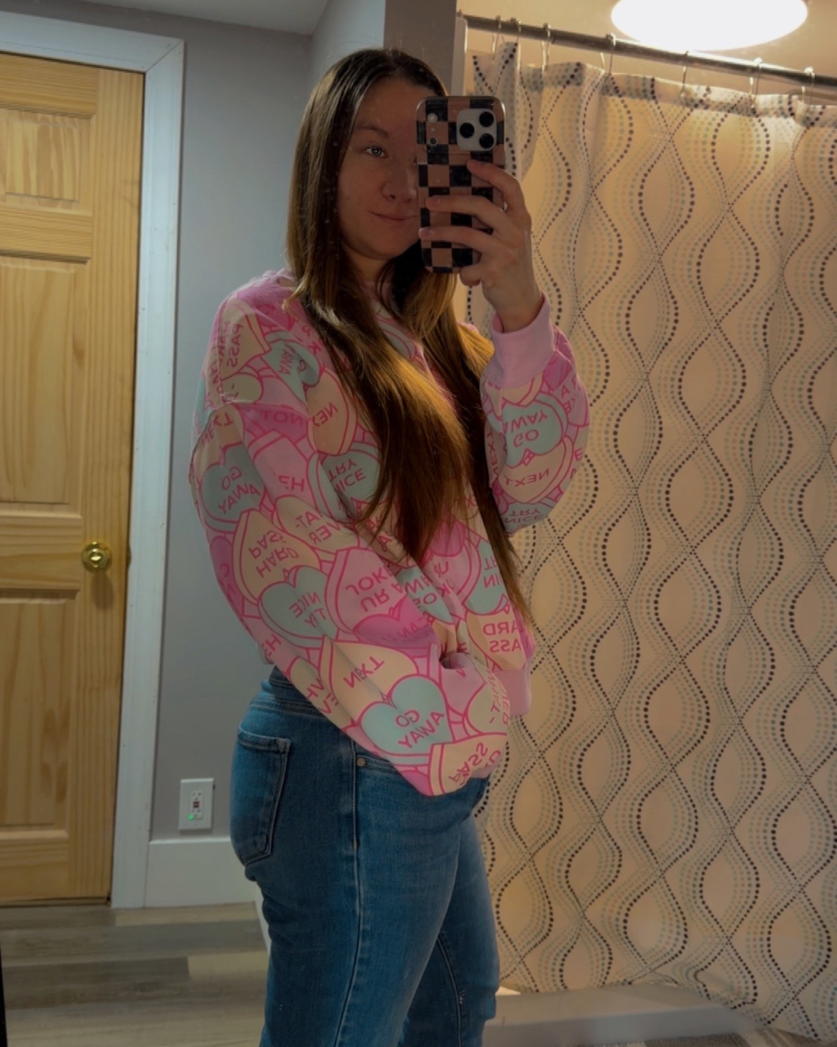 LOVE this candy hearts crewneck! It’s so soft and cozy, perfect for everyday wear. Candy hearts sweatshirt, casual outfits 

#LTKFindsUnder50 #LTKootd #LTKSeasonal