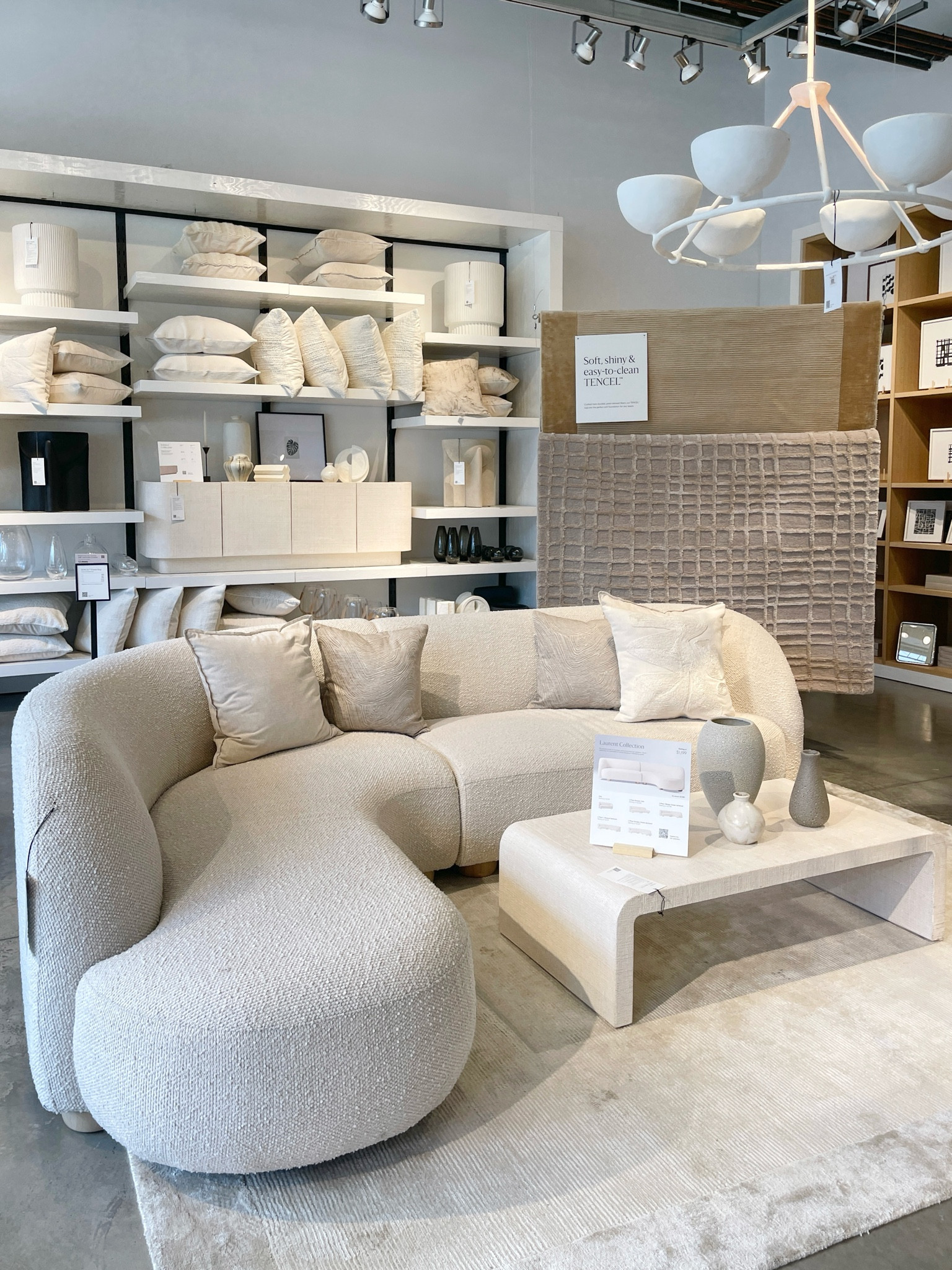 Bright contemporary living room inspo featuring this stunning curved white sectional from West Elm. There's something luxurious about a white couch—elegant, timeless, and effortlessly chic. The graceful curves and cozy boucle fabric envelop you in comfort while adding shape and style to your space. 🤍

#LTKHome #LTKSaleAlert