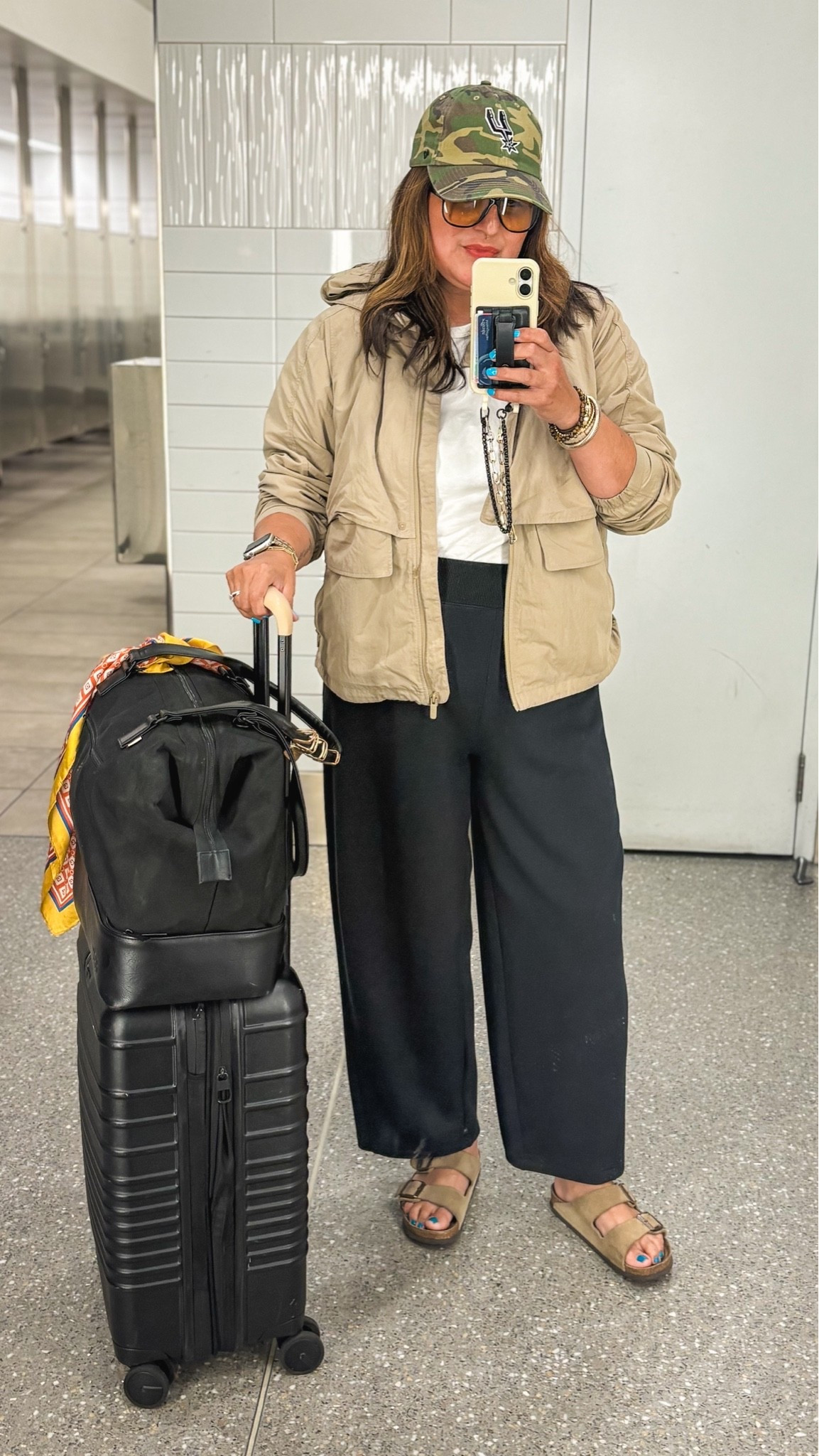 Today’s travel ‘fit:
Spurs hat
Lululemon jacket - 14
Spanx AirEssentials tapered pant - XL
GAP Factory tee - XL
Beis roller carry-on
Beis mini weekend traveler 
@gapstyle @lululemon @Spanx @beistravel

#LTKOver40 #LTKMidsize #LTKTravel