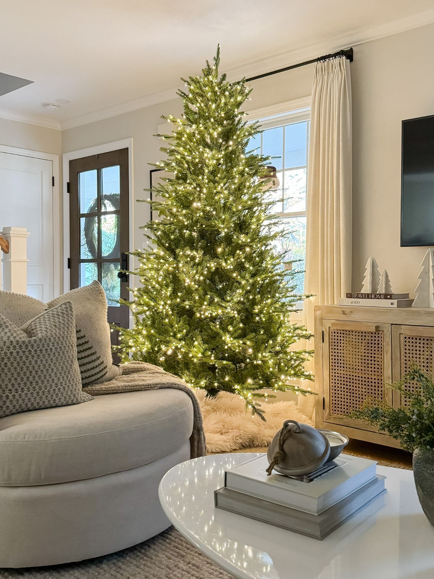 Classic Christmas living room styling holiday home decor home favorites cozy Christmas tree styling neutral home coastal decor sherricalnanhome

#LTKHoliday #LTKSeasonal #LTKHome