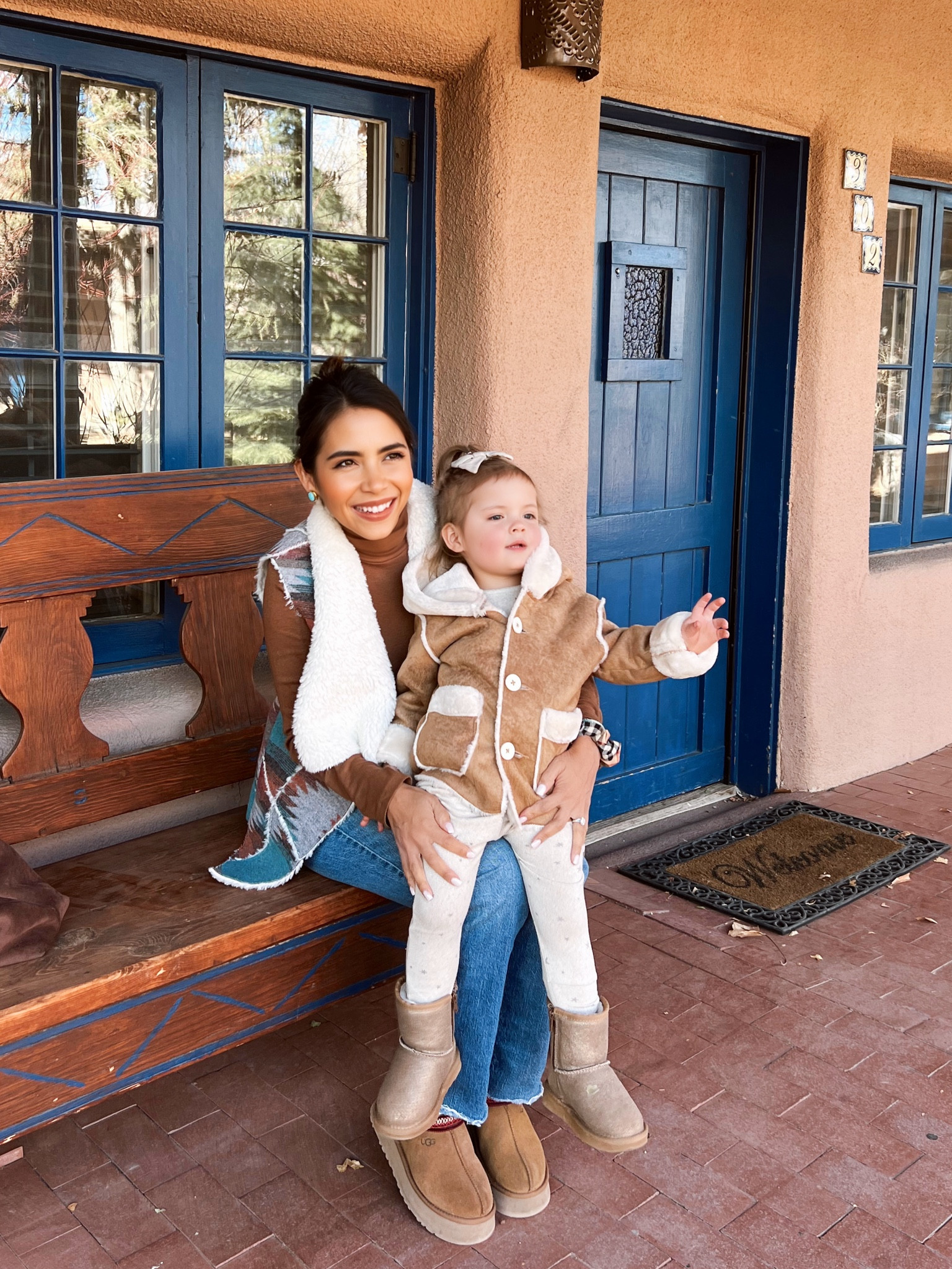 Winter outfit 
Brown turtle neck 
Aztec vest 
Faux shearling coat 
Uggs 


#LTKFamily #LTKKids