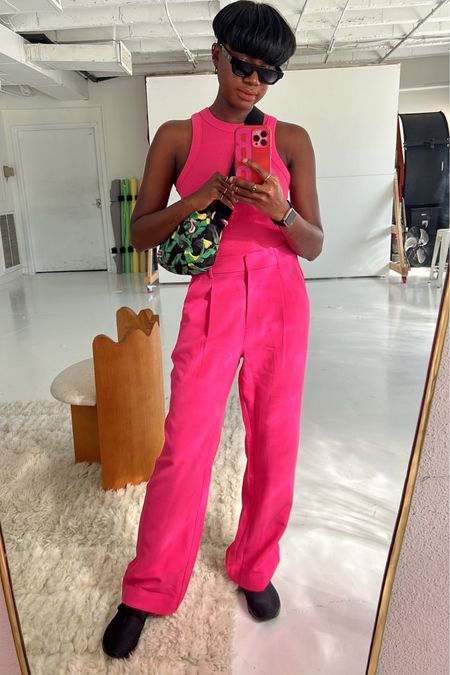 Monochrome pink outfit! Pink racerback tank and pink pleated trousers. I’m wearing a small in the tank and medium in the pants for an oversized comfy fit! 

#LTKFind #LTKworkwear #LTKunder100