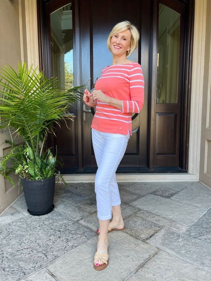 Nautical but nice ⚓️ This coral striped tee brings a fresh twist to a timeless classic—paired with cropped white pants and easy slides for a breezy, pulled-together look. 

#Over50Style #CoastalChic #EffortlessEveryday #NauticalVibes #ChicAtAnyAge

#LTKSeasonal #LTKOver40 #LTKStyleTip