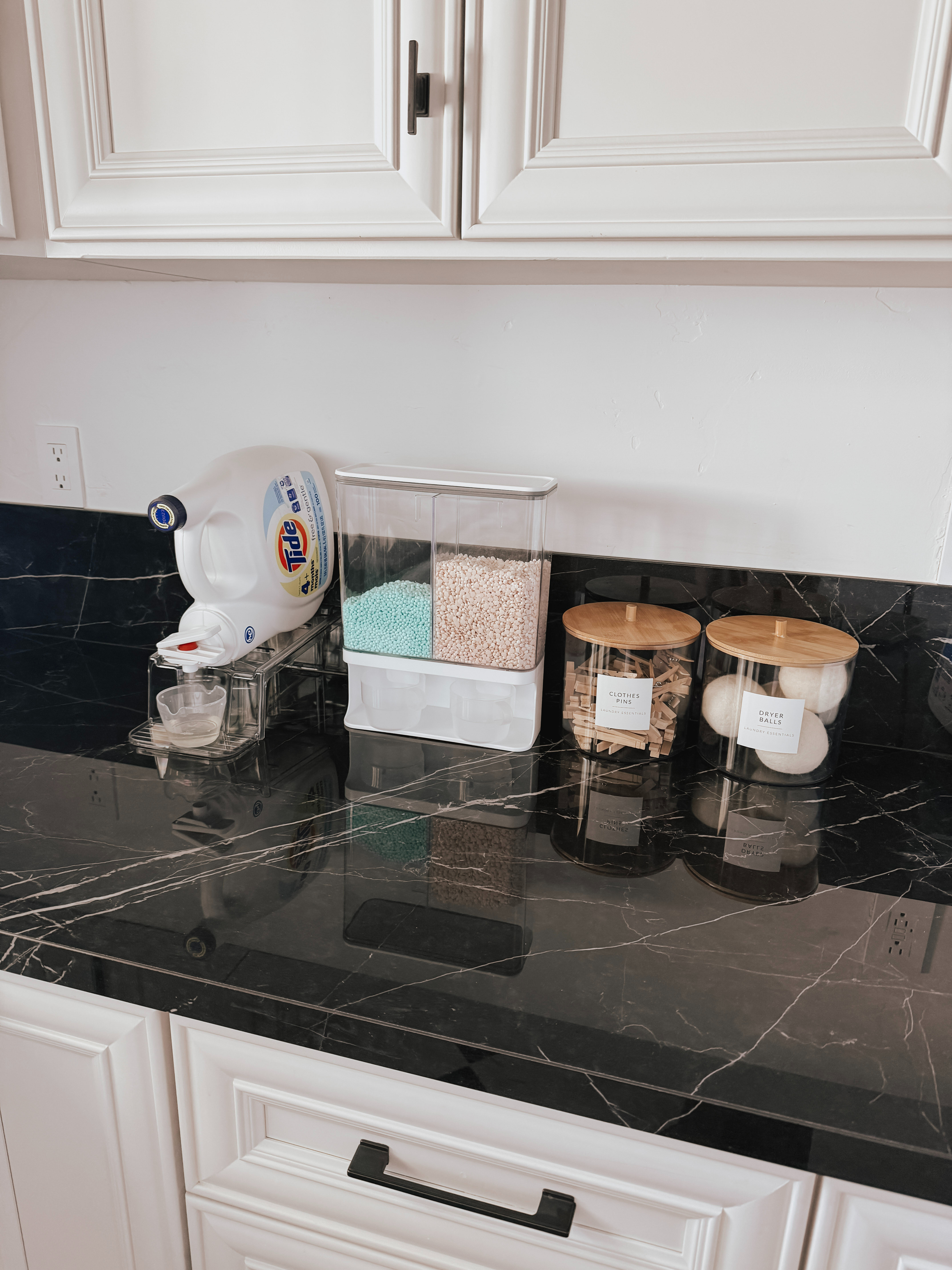 My favorite laundry room organization finds, including laundry detergent dispensers, storage solutions, stain remover essentials, dryer sheet organizers, and other laundry day favorites that make the space more functional and organized. 

 #LTKHome