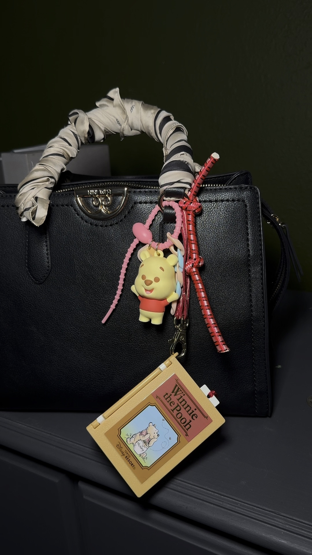 Bag charms inspired by Miu Miu’s 2024 campaign with a Pooh Bear twist 🐻 #bagcharm #winniethepoohinspo #winniethepoohbag 

#LTKStyleTip #LTKItBag #LTKSeasonal