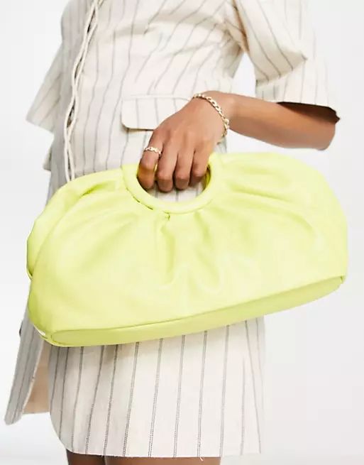 ASOS DESIGN cut out grab clutch bag in lime | ASOS (Global)