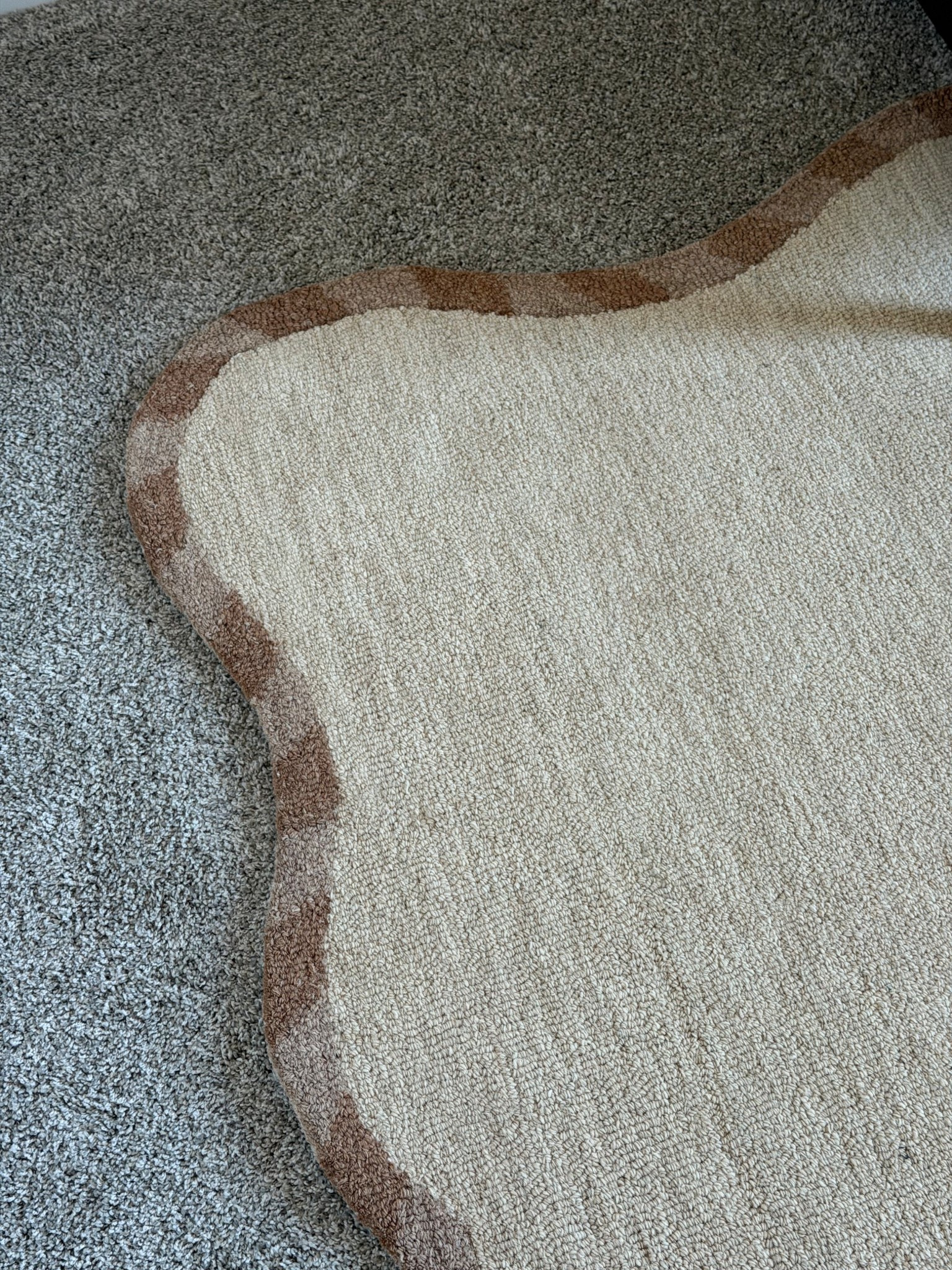 The cutest rug! Using this is a little girls room. Neutral yet a little bit of fun. Wavy rug. Scalloped rug. Wool rug  

#LTKHome #LTKKids #LTKmomlife