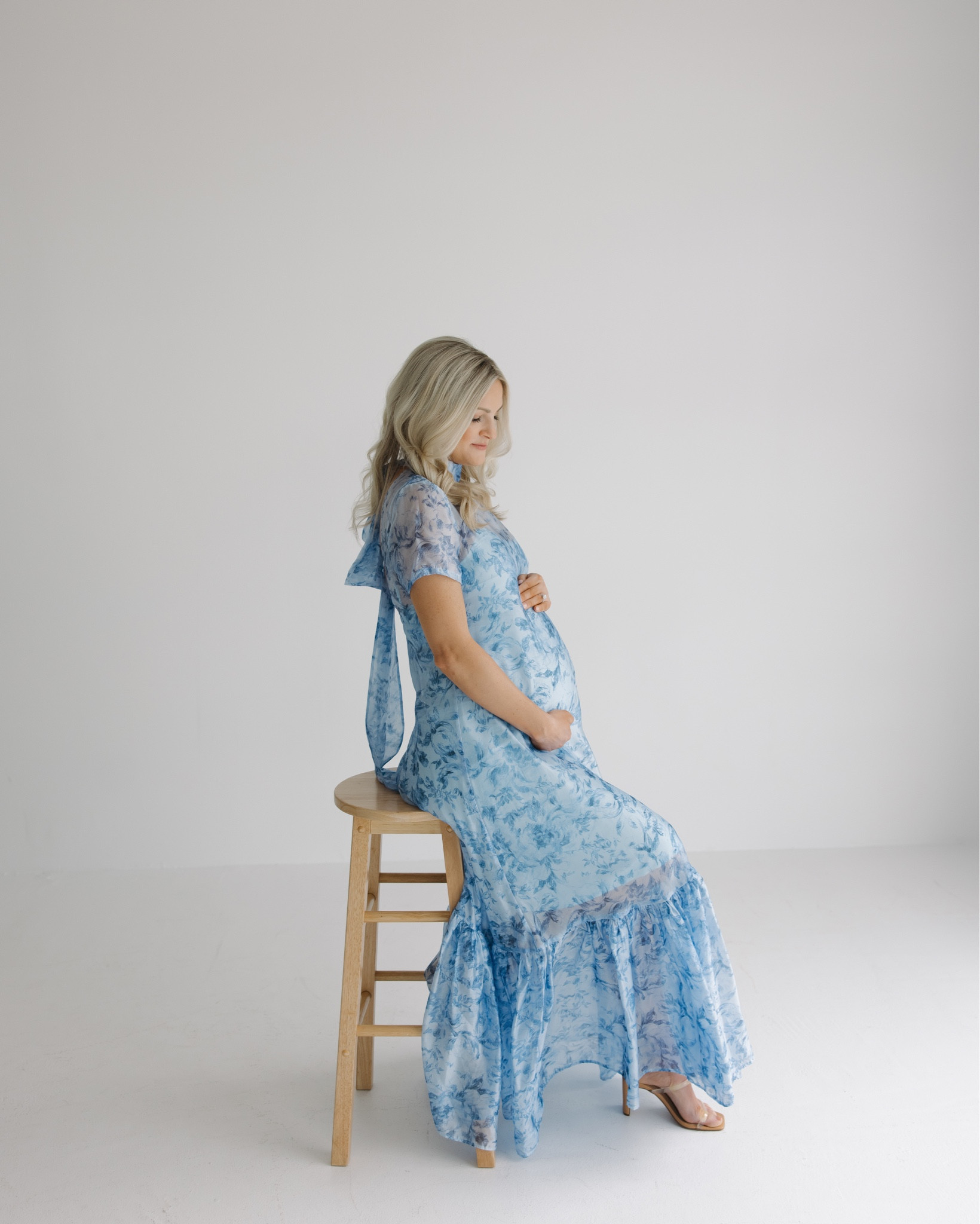 Maternity pictures 🤍🩵 #maternityphotoshoot #maternitydress #studiomaternitypictures 

#LTKBump #LTKFamily #LTKBaby