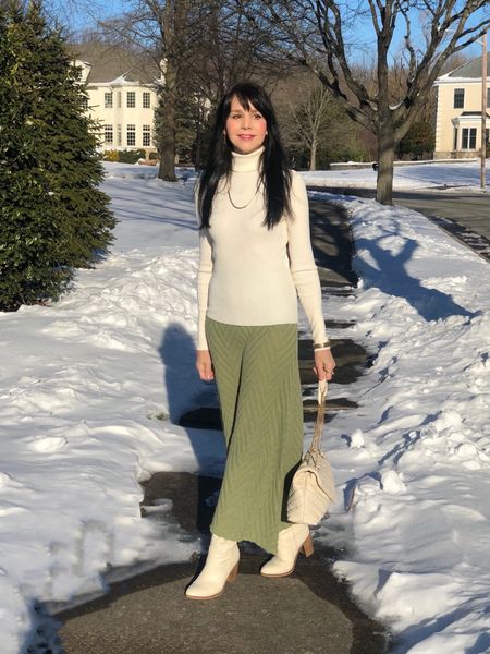 Giving the green chevron knit skirt from my previous post a completely different vibe with this really soft ivory turtleneck! Adding ivory boots and bag, along with the turtleneck, gives the skirt a more elegant look compared to the previous cute floral print sweater. Complete the look with a faux fur coat.
