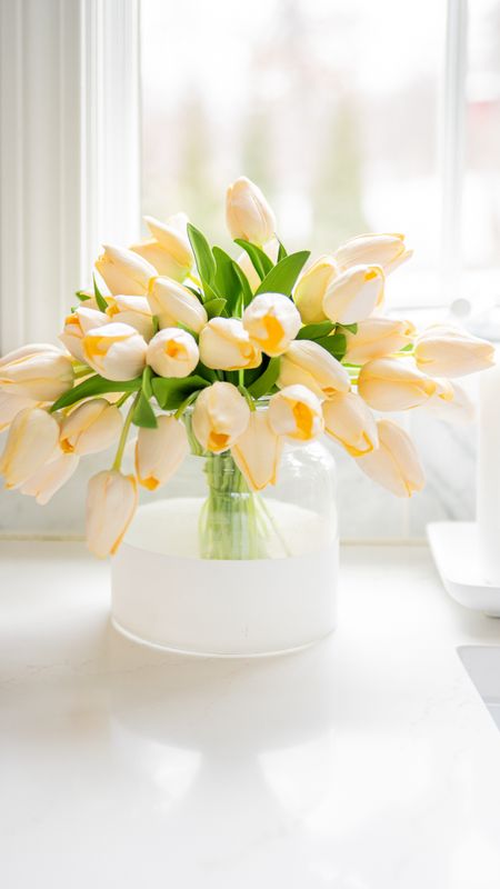 Add a touch of spring to your home decor with these artificial tulips and glass vase. Coastal style home decor.