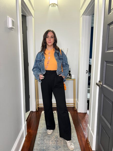 Rent the runway. Cut out top. Orange top. Cropped Jean jacket. Jean jacket. Black trousers. Orange Bottega Venetta bag. Casual spring outfit.

#LTKstyletip #LTKSeasonal
