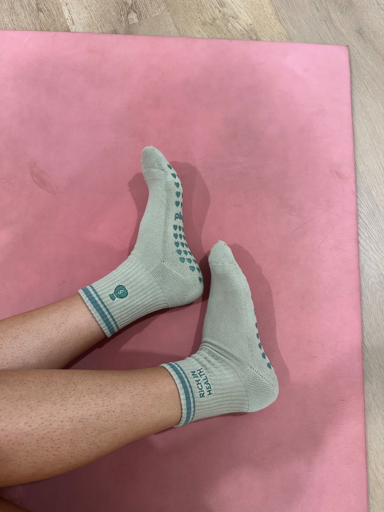 Stay grounded in green. Rich in Health grip socks are colored like cash with a money bag detail — because your wellness is priceless.
PRODUCT DESCRIPTION
Health is your greatest investment — but looking cute while you earn it? That’s just smart money.
The Rich in Health Grip Socks are designed in the shade of a dollar bill, complete with “Rich in Health” on one side and a money bag embroidery on the other. They’re a playful reminder that the real flex is feeling good.
Made with premium cotton and our signature non-slip grips, these socks keep you steady from Pilates to payday.

#LTKActive #LTKootd #LTKfitnessgoals