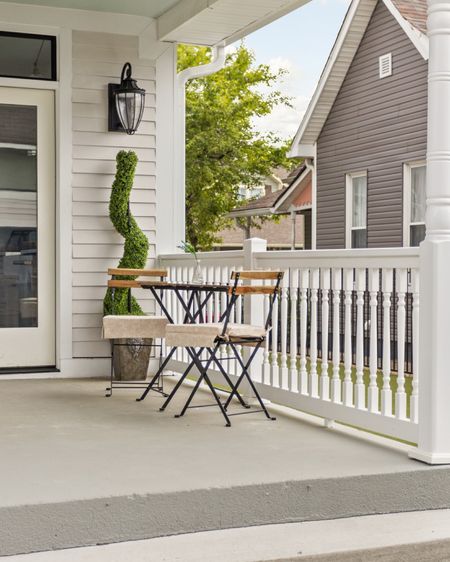 Outdoor bistro tables make the exterior space feel welcoming.

#LTKhome
