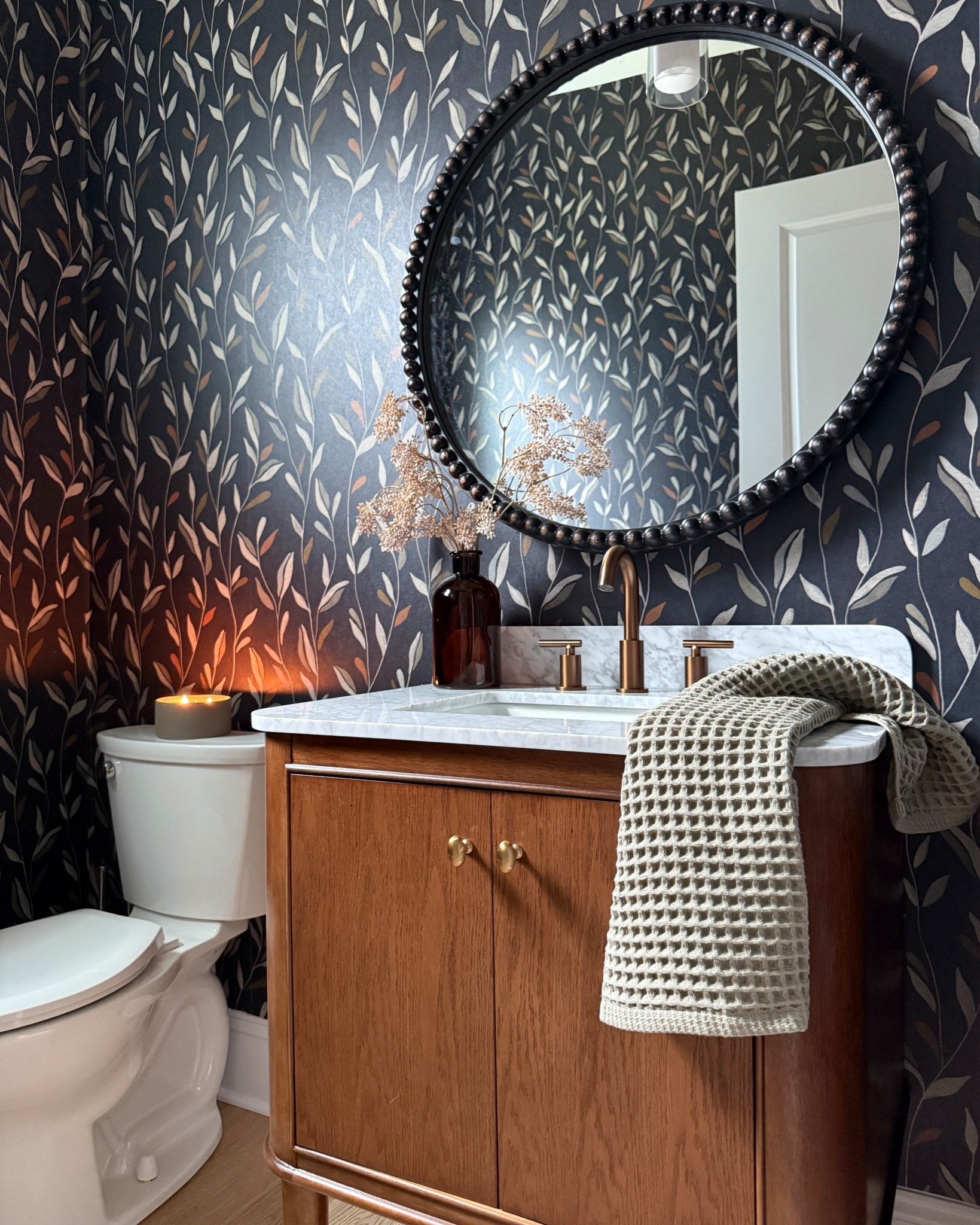 Half bath moody DIY makeover! Dark wood vanity, bronze faucet, window film, marble vanity

#LTKFindsUnder50 #LTKHome #LTKSaleAlert