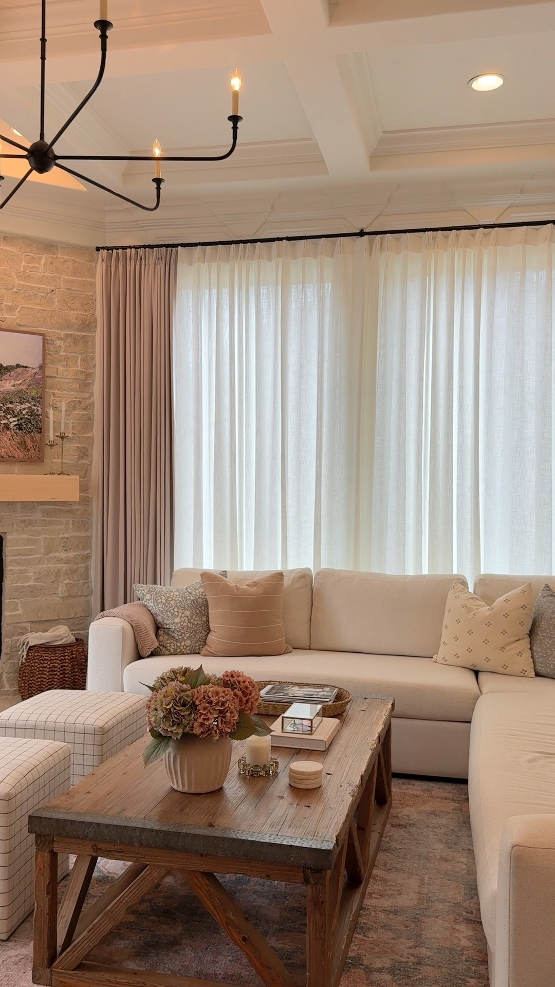 Added a wall of drapery panels. Love the privacy they afford plus the light they let in. The price is FANTASTIC. Linked everything we used.