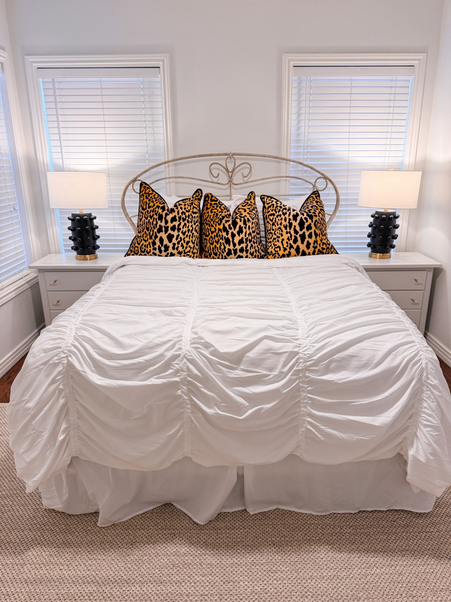 Guest room. White linens. Queen bed. Bedroom. Lamps. Leopard  

#LTKHome #LTKFindsUnder100