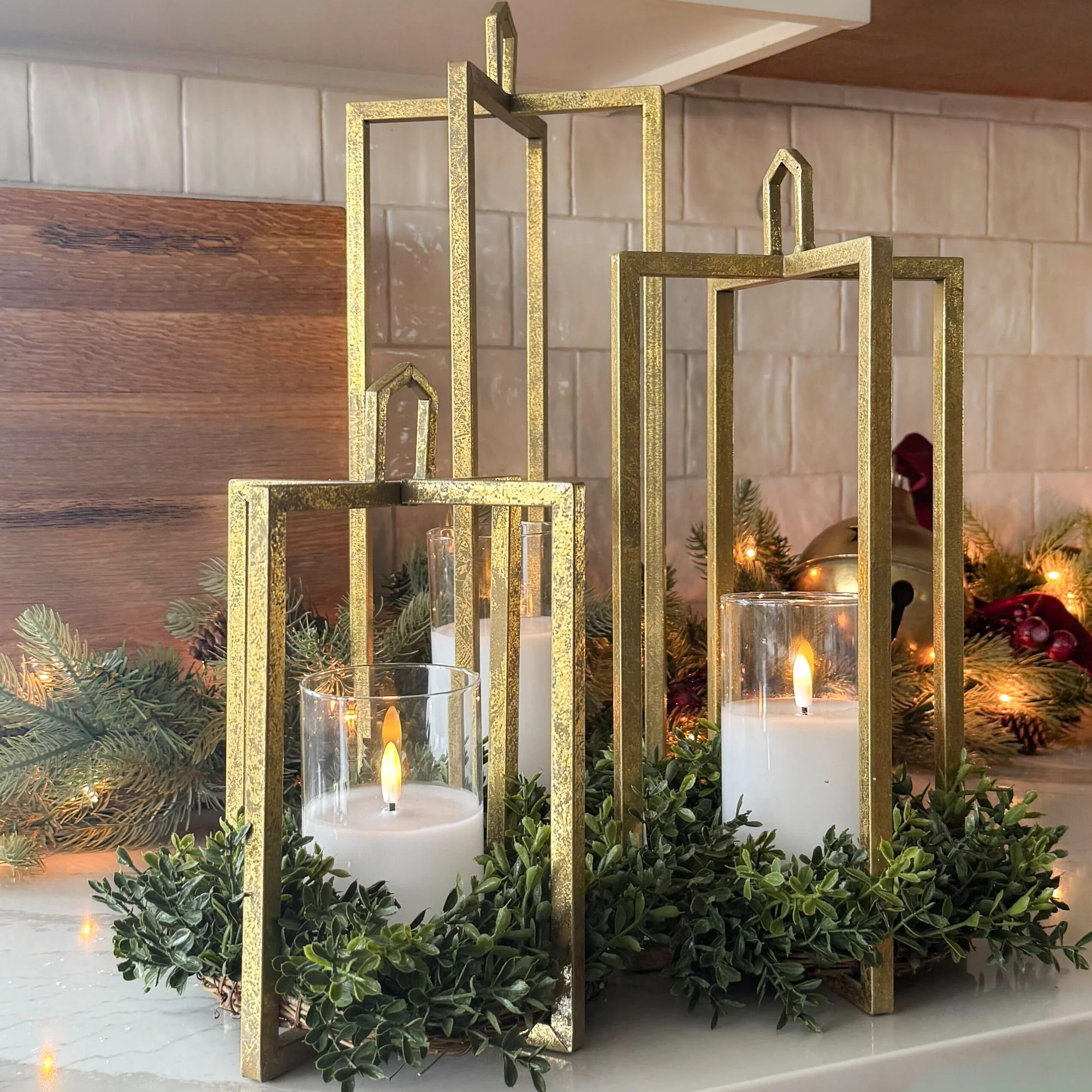 ARRANGEMENT: Gold Mod Lanterns with Flameless Candles and Boxwood Ring | Interior Delights
