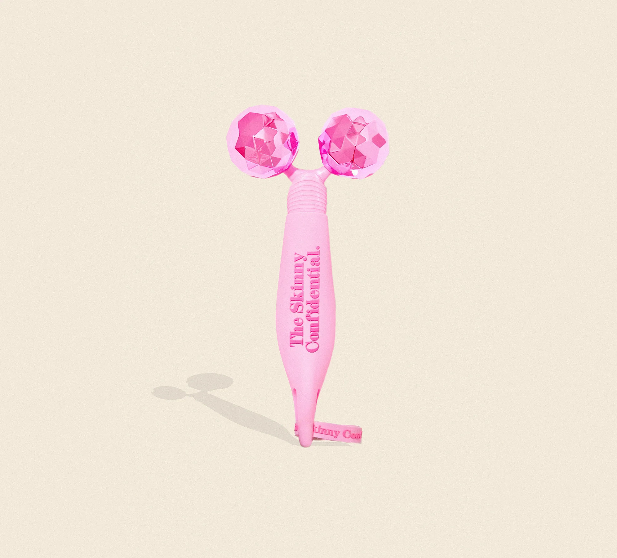 PINK BALLS FACE MASSAGER | The Skinny Confidential