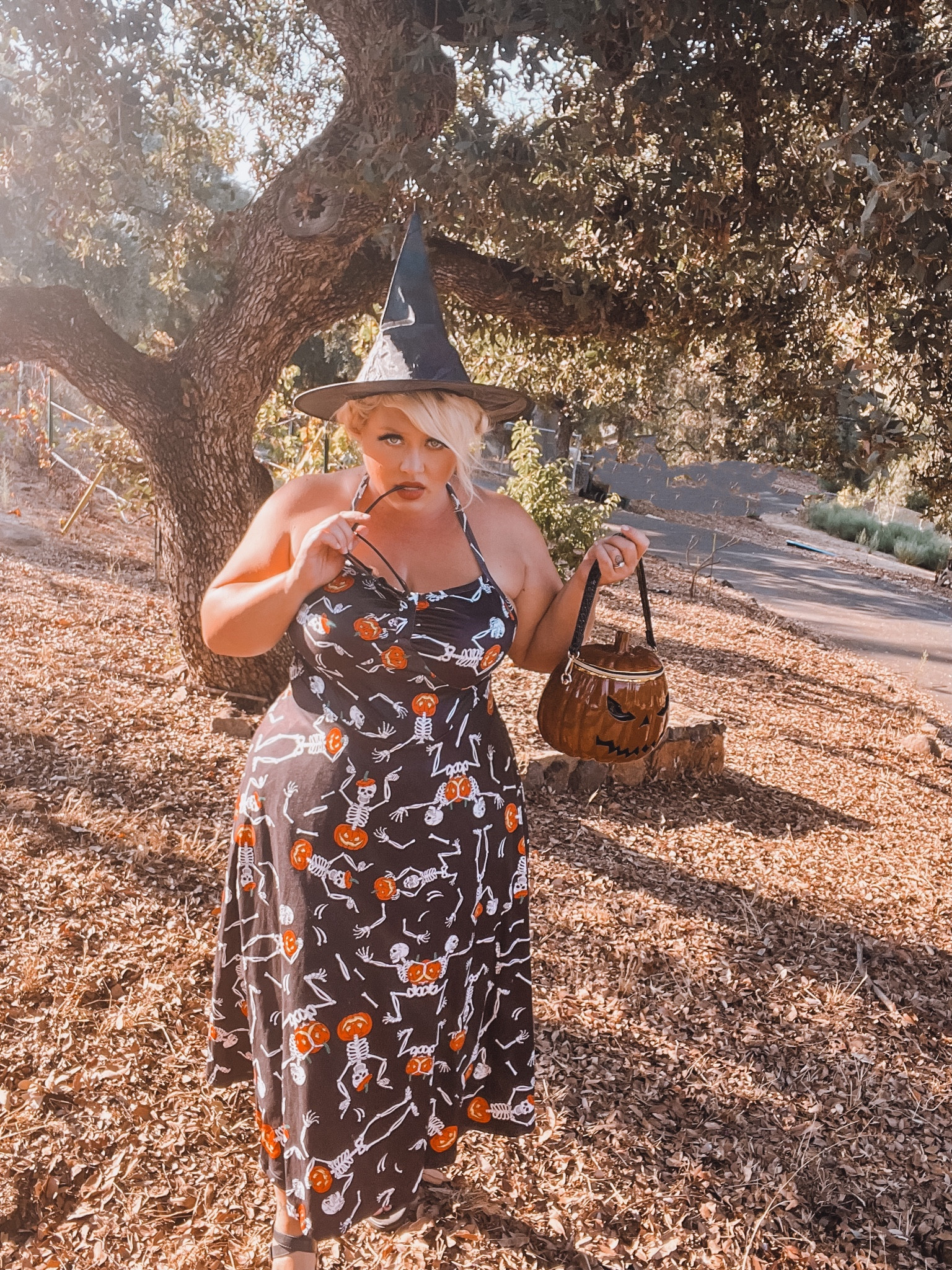 Boo to you! 
skeleton/ pumpkin halter dress
witch hat
pumpkin purse

#LTKPlusSize #LTKSeasonal #LTKHalloween