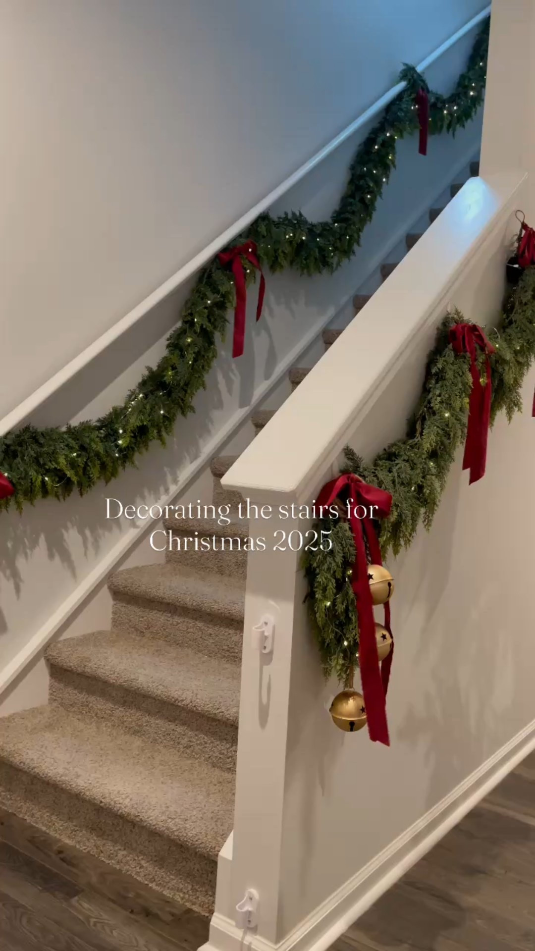 Decorating the stairs of my new home for Christmas 2025 ✨🫶🏻 Christmas decor ideas 

Cedar garland, wine red ribbon in silk, easy way to decorate the stairs for Christmas 

#LTKHome #LTKSeasonal #LTKHoliday