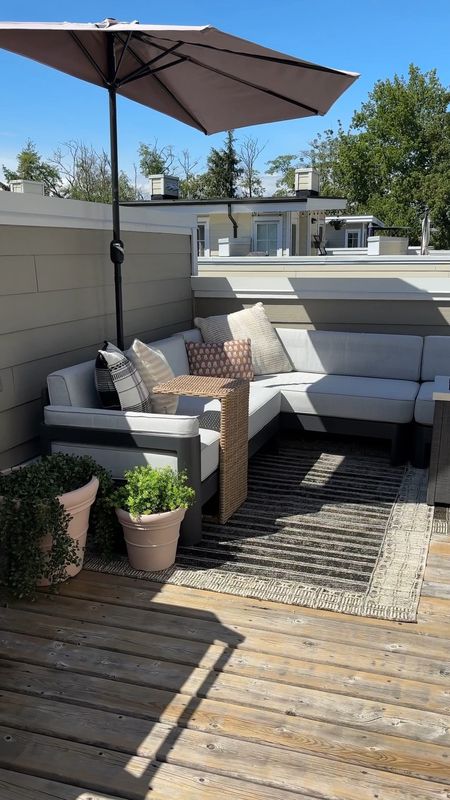 Come open our rooftop patio with me! We live in a townhouse and don’t have a backyard, so our roof IS our backyard (small space living, represent!). ☀️
Everything you see here was purchased with my own money over the course of seven years and was hand-selected to go with our modern traditional home. These are all items we use daily in the summer; we’re talking a modern patio dining set, a transitional indoor / outdoor rug, an aesthetic deck box, and some faux outdoor plants that look super real. 

#wayfairpartner #wayfairfinds #patiofurniture #modernorganic

#LTKSeasonal #LTKHome #LTKVideo