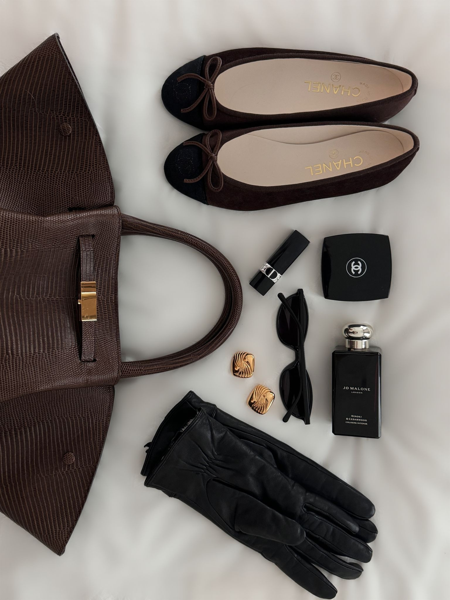 Chocolate and suede autumn accessories 🤎 featuring Dior and Chanel makeup essentials, black pointed oval sunglasses and leather gloves, suede Chanel ballet flats and a very exciting upcoming design collaboration between myself and Demellier… #FashionMonth

#LTKautumn #LTKbeauty