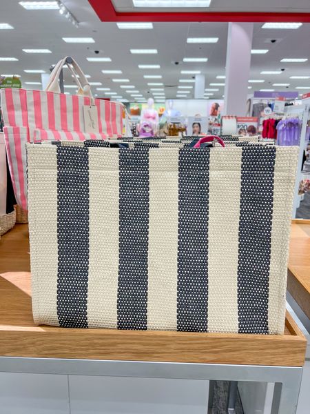 Striped beach bag for your next trip or to sit poolside! Several colors to choose from! 

Pool bag, lake bag, pool tote, beach tote, beach bag, weekend totee

#LTKFindsUnder50 #LTKItBag #LTKTravel