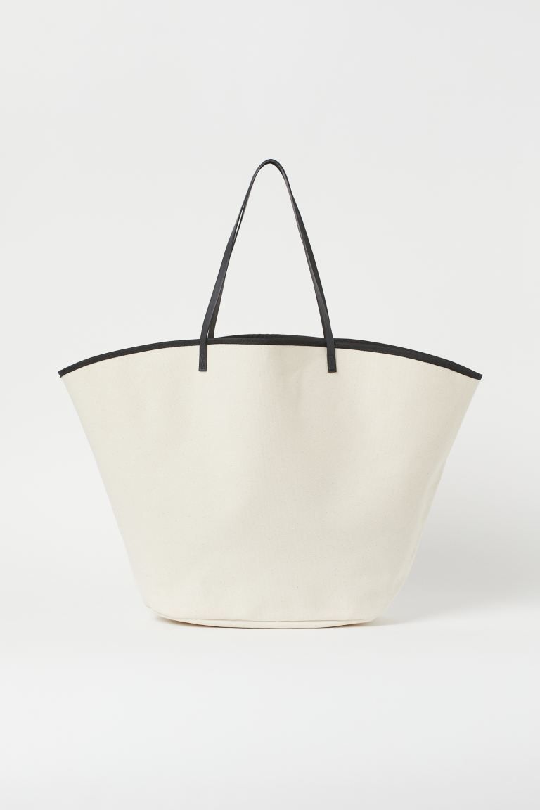 Bag in cotton canvas that’s perfect for packing with your towel and water bottle when you’re ... | H&M (UK, MY, IN, SG, PH, TW, HK)